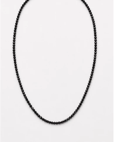 Collar Onyx — destellos elegantes en negro y dorado