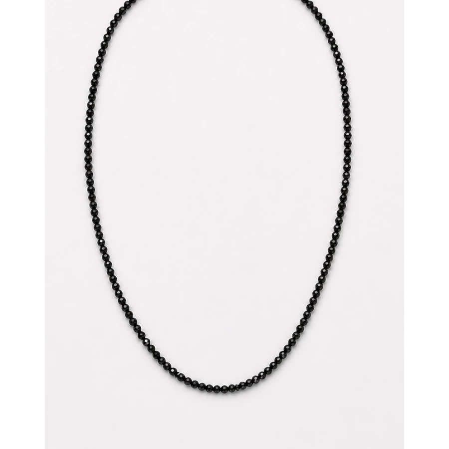 Collar Onyx — destellos elegantes en negro y dorado Collar Onyx — destellos elegantes en negro y dorado