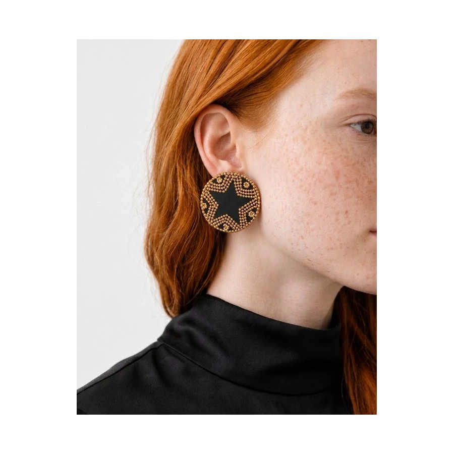 Pendientes Black Star — diseño geométrico en dorado y negro Pendientes Black Star — diseño geométrico en dorado y negro