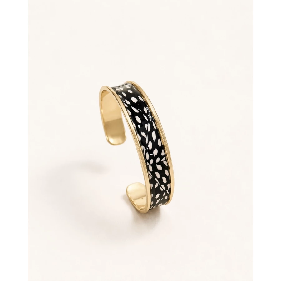 Brazalete Savannah — elegancia salvaje en dorado, negro y balnco. Brazalete Savannah — elegancia salvaje en dorado, negro y balnco.