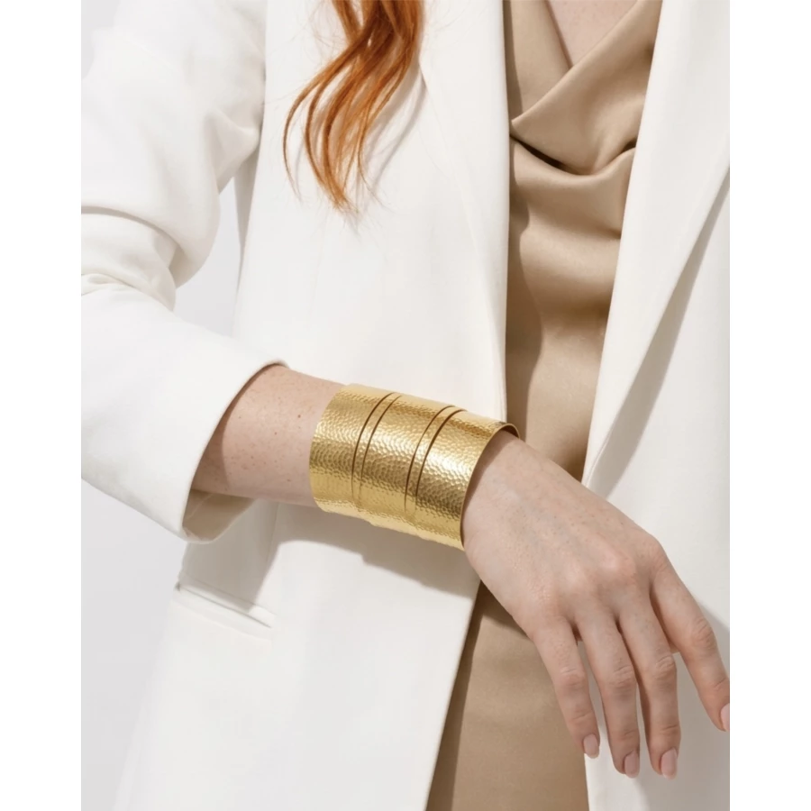 BrazaleBrazalete Évora — textura artesanal y elegancia dorada.te