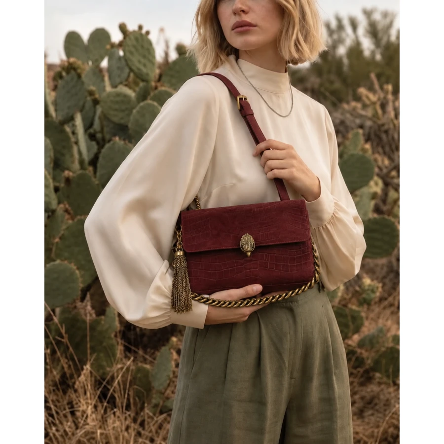 Bolso Kurt Geiger Celia Flap Shoulder Bag — Sofisticación y carácter en color vino