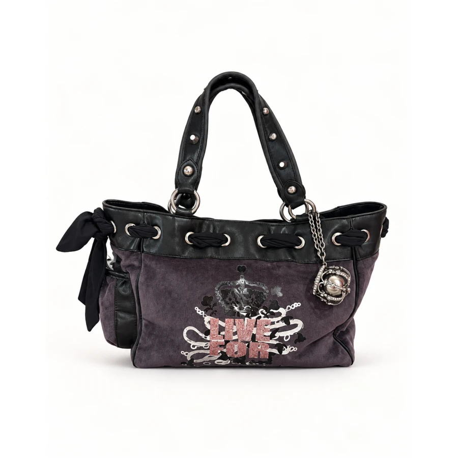 Bolso Juicy Couture Live For — un diseño con actitud y personalidad.