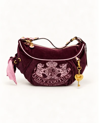 Bolso Juicy Couture Burgundy Love — un toque romántico con carácter.